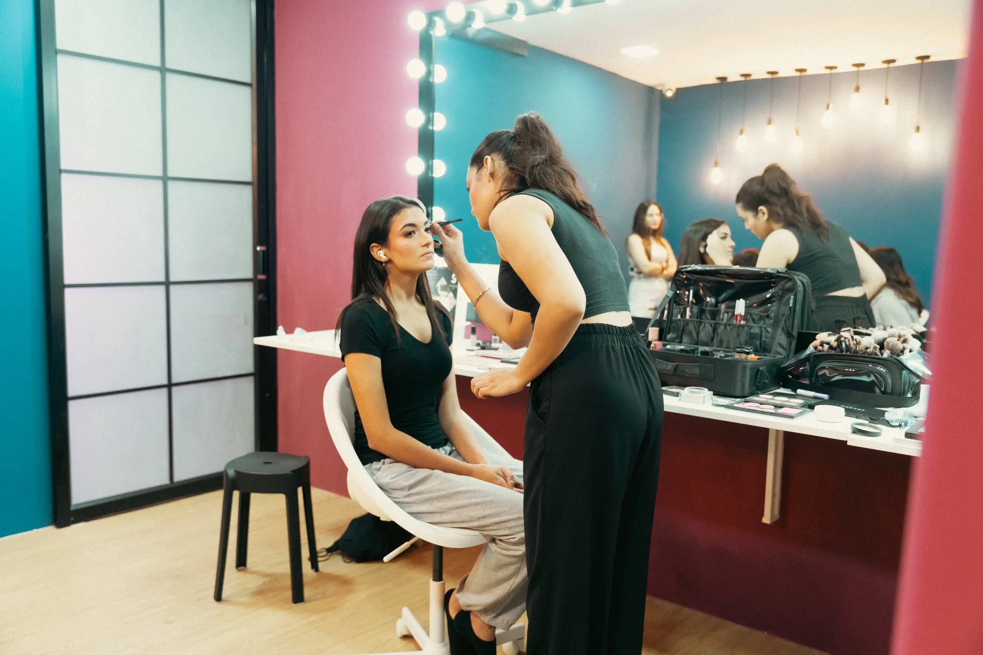 Makeup artist at work during the Sumedhaa x Trillions shoot at SparQ Spaces