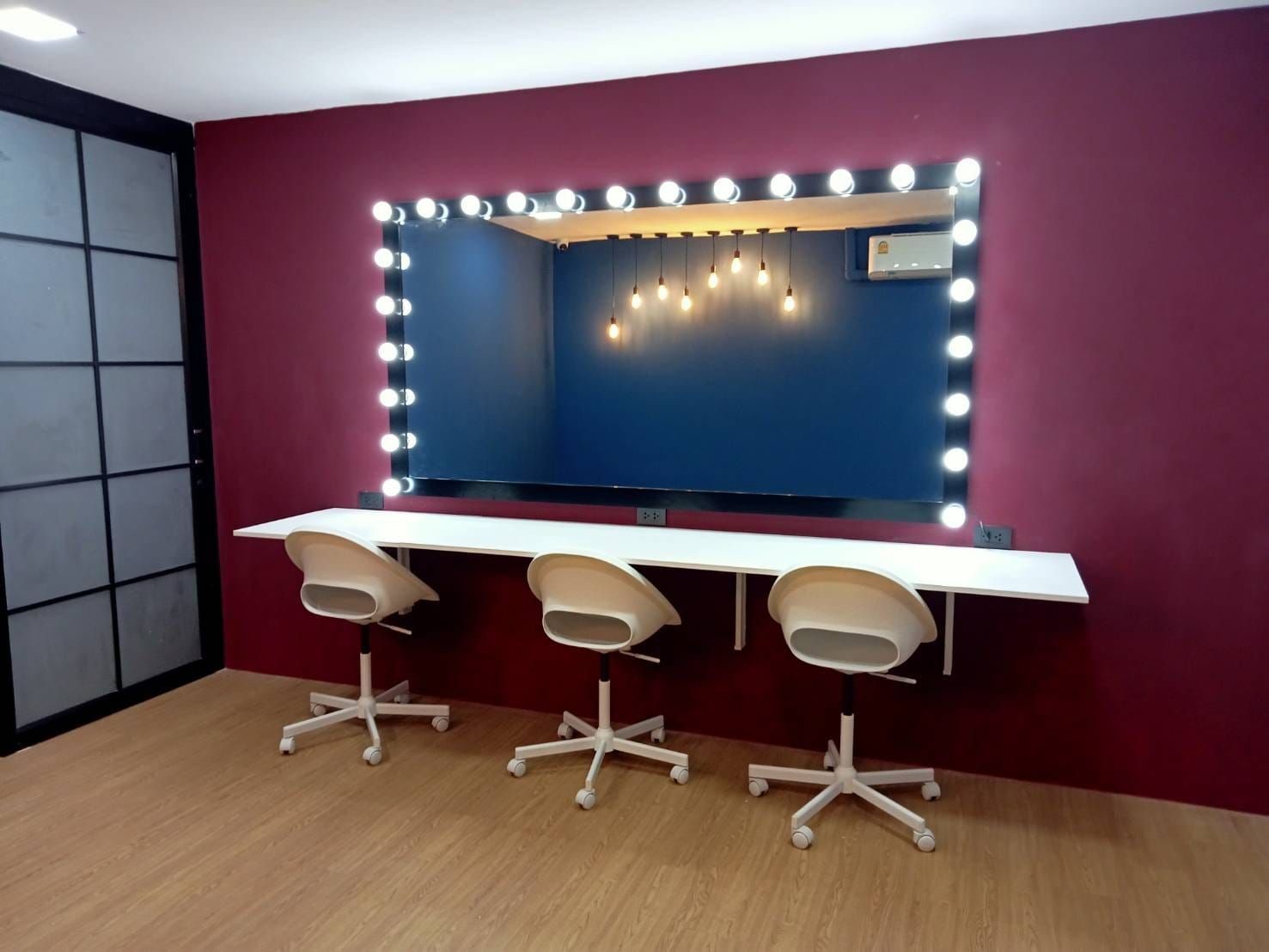 Glamour Gazebo — Hollywood vanity with warm bulb lights